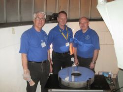 Mid-Kent Astronomical Society members Bob Tellervey, Noel Clark
  and Ian Hargraves pictured left to right with the large telescope mirror.